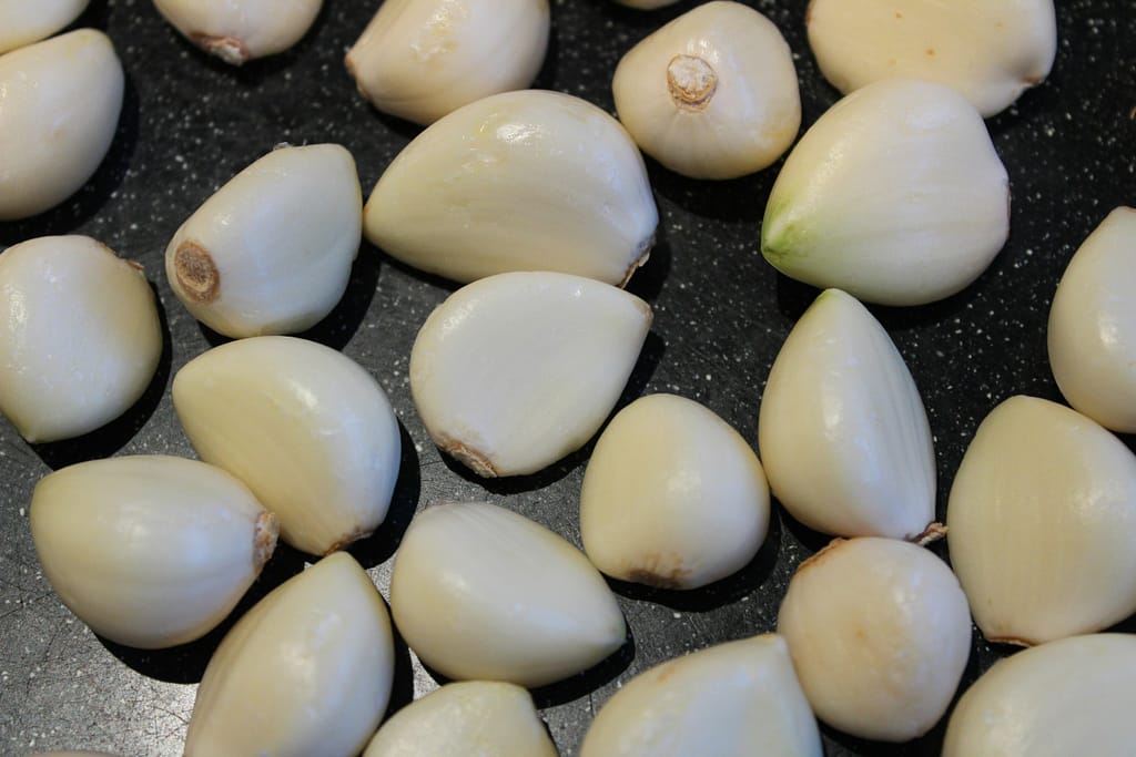 peeled garlic ready for cooking