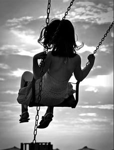 girl swinging