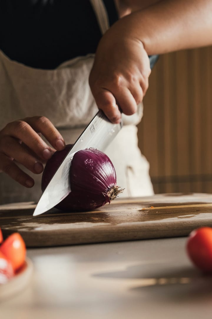 chopping a red onion