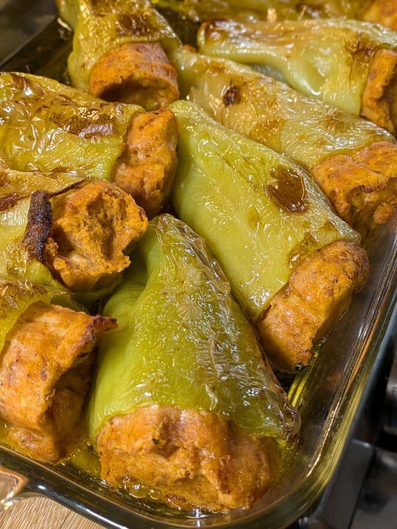 baked stuffed peppers in a baking dish
