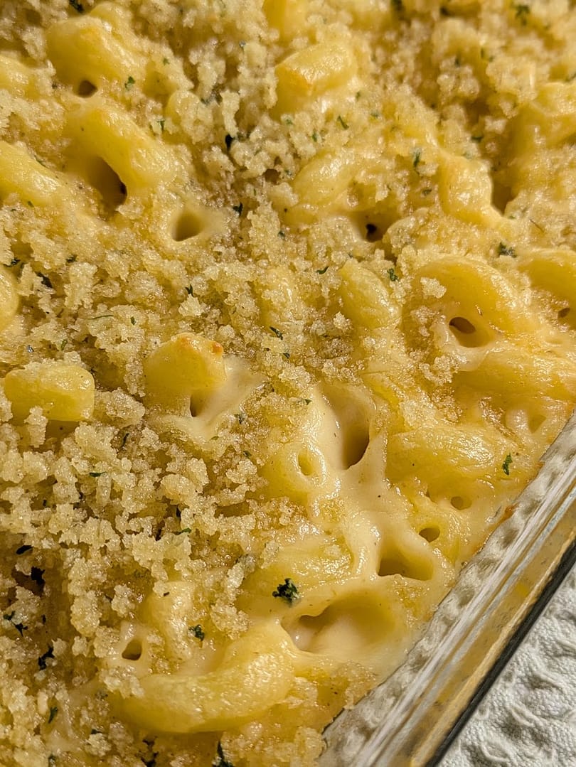 Warm and creamy homemade macaroni and cheese topped with crispy, golden breadcrumbs—classic comfort food baked to perfection in a cozy casserole dish