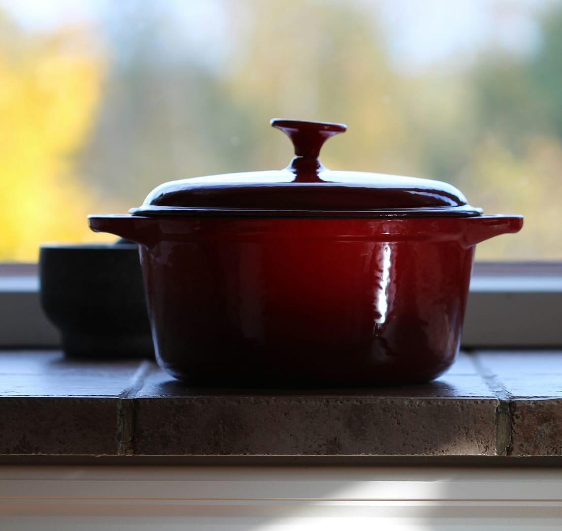 Dutch oven displayed on a kitchen counter for one-pot cooking
